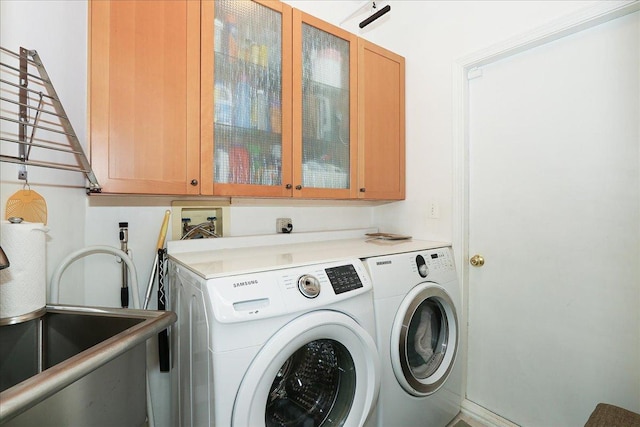 768 W St Johns Pl, Addison, IL 60101 - laundry area with washing machine and clothes dryer and cabinet space