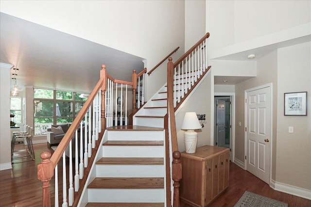768 W St Johns Pl, Addison, IL 60101 - stairs with wood finished floors and a high ceiling