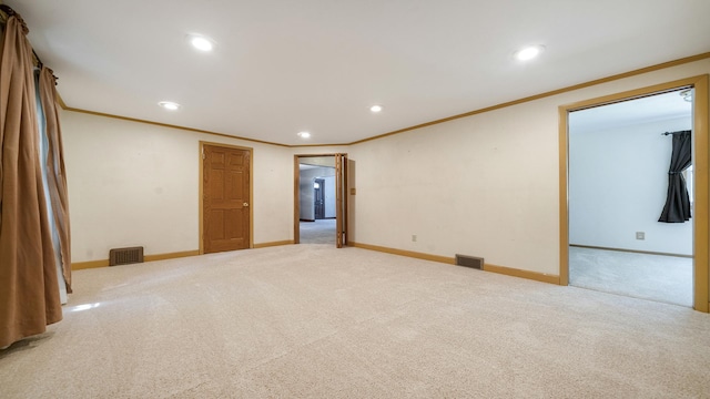 931 C St, Rockford, IL 61107 - carpeted empty room featuring ornamental molding and recessed lighting