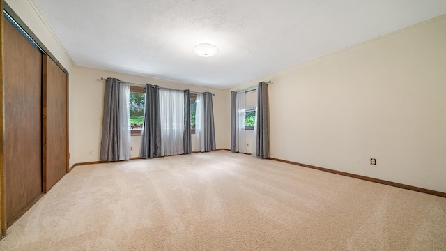 931 C St, Rockford, IL 61107 - unfurnished room with healthy amount of natural light and light colored carpet