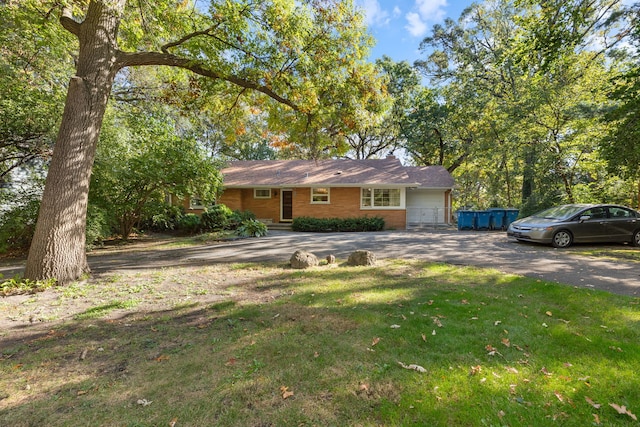 14545 Laporte Ave, Midlothian, IL 60445 - single story home featuring a front lawn and asphalt driveway