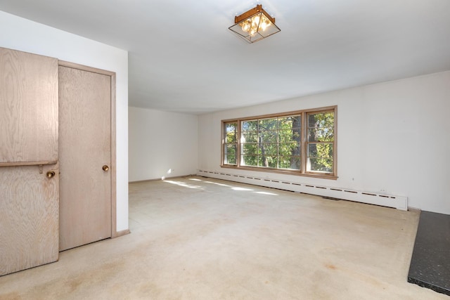 14545 Laporte Ave, Midlothian, IL 60445 - carpeted empty room with a baseboard heating unit