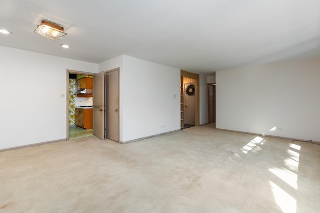 14545 Laporte Ave, Midlothian, IL 60445 - unfurnished room with light colored carpet and recessed lighting