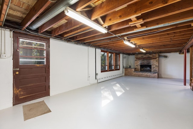 14545 Laporte Ave, Midlothian, IL 60445 - basement with baseboard heating and a fireplace