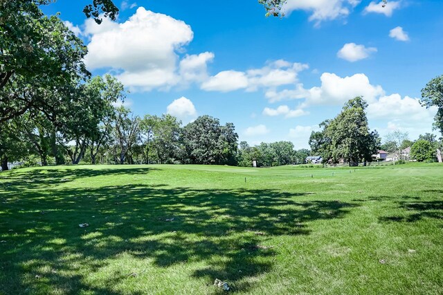 1640 Royal Oak Rd Unit 4, Darien, IL 60561 - view of property's community with a yard and view of wooded area