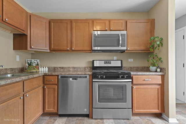 1808 Jethro Ave, Zion, IL 60099 - kitchen featuring appliances with stainless steel finishes and a sink