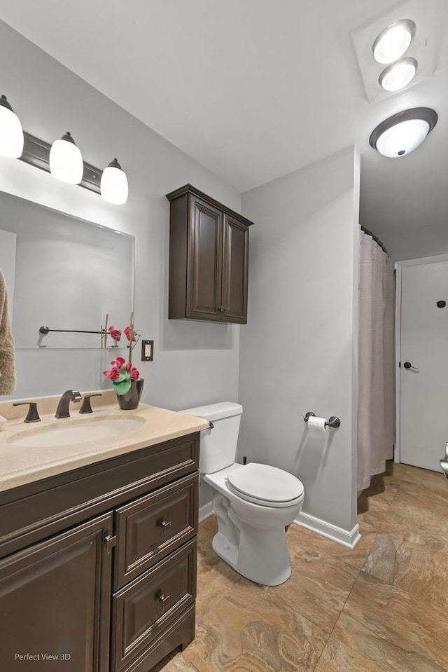 1808 Jethro Ave, Zion, IL 60099 - bathroom featuring vanity, stone finish flooring, and curtained shower