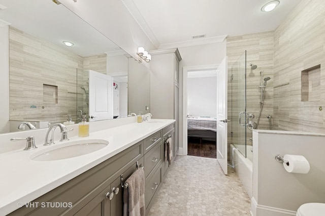 3526 N Hamilton Ave, Chicago, IL 60618 - ensuite bathroom with double vanity, combined bath / shower with glass door, crown molding, recessed lighting, and tile patterned flooring