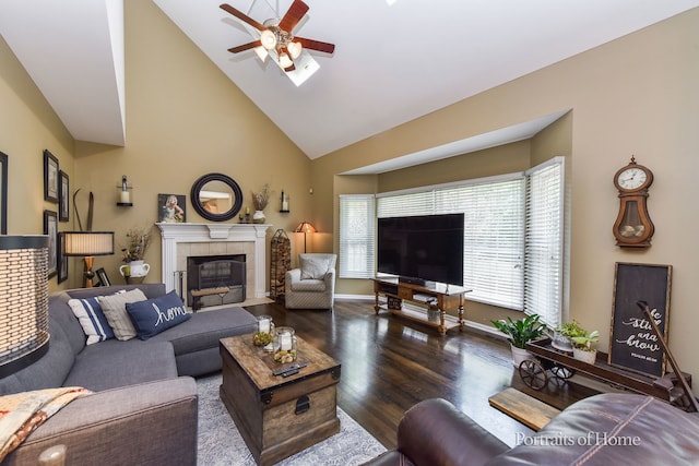 459 Waubonsee Cir, Oswego, IL 60543 - living area with a ceiling fan, dark wood-type flooring, high vaulted ceiling, and a fireplace