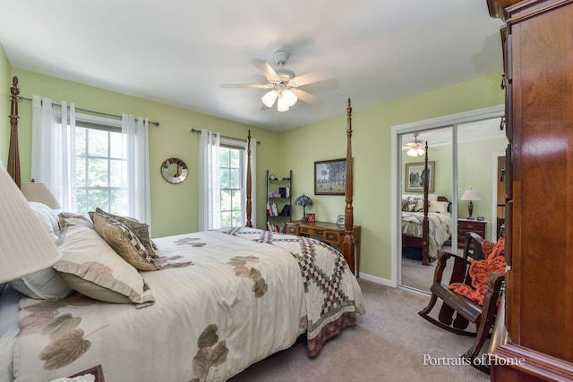 459 Waubonsee Cir, Oswego, IL 60543 - bedroom featuring carpet flooring, a closet, and a ceiling fan