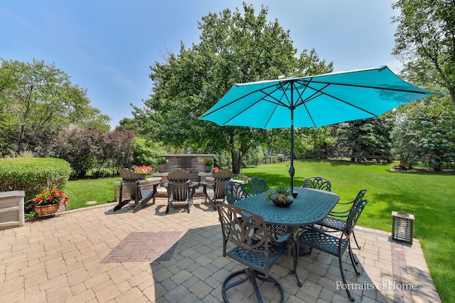 459 Waubonsee Cir, Oswego, IL 60543 - view of patio with outdoor dining area and view of wooded area