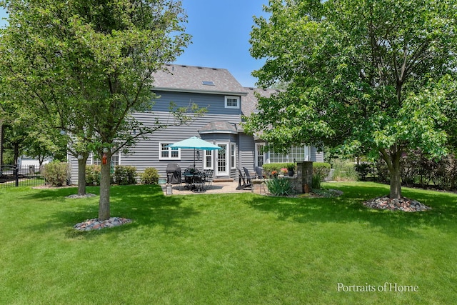 459 Waubonsee Cir, Oswego, IL 60543 - back of property with a patio and a shingled roof