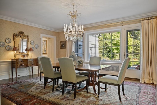 5 Woodley Rd, Winnetka, IL 60093 - dining space with a chandelier, crown molding, wallpapered walls, and a wainscoted wall