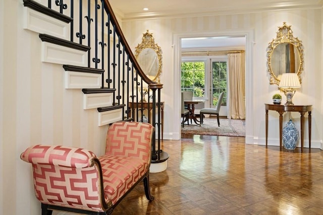 5 Woodley Rd, Winnetka, IL 60093 - entryway with crown molding, wallpapered walls, and stairs