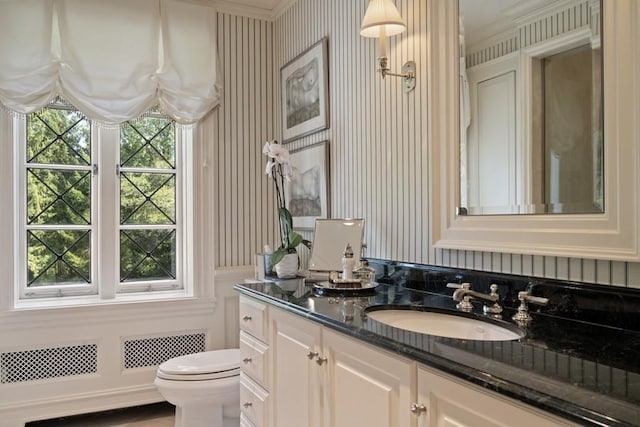 5 Woodley Rd, Winnetka, IL 60093 - bathroom with vanity, ornamental molding, wainscoting, and a decorative wall