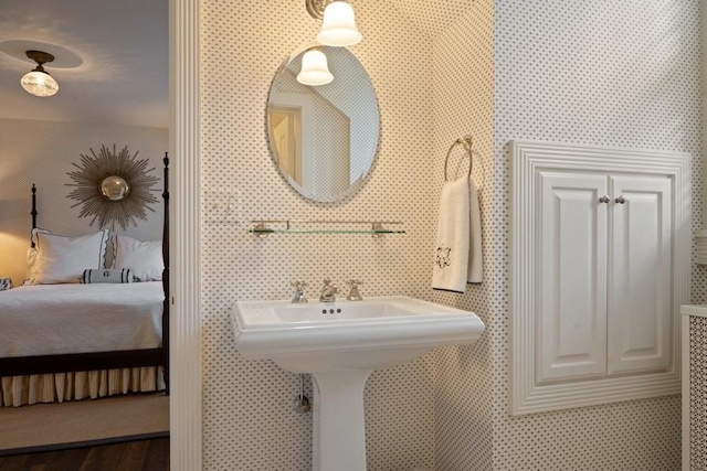 5 Woodley Rd, Winnetka, IL 60093 - ensuite bathroom featuring a sink and wood finished floors