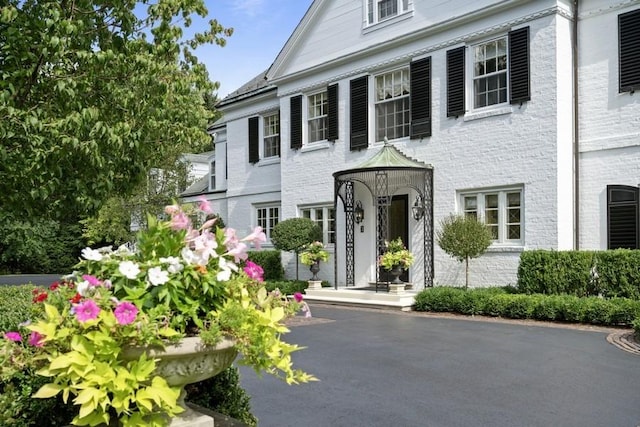 5 Woodley Rd, Winnetka, IL 60093 - greek revival house with brick siding