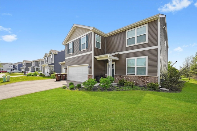 2029 Magnolia Ln, Wonder Lake, IL 60097 - view of front of home with an attached garage, concrete driveway, a front lawn, a residential view, and brick siding