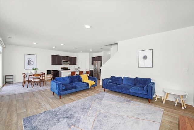 2029 Magnolia Ln, Wonder Lake, IL 60097 - living room featuring light wood-style flooring and recessed lighting