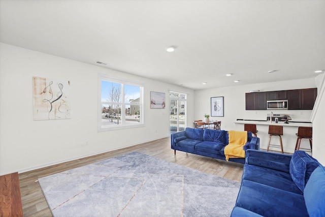 2029 Magnolia Ln, Wonder Lake, IL 60097 - living room with light wood finished floors and recessed lighting