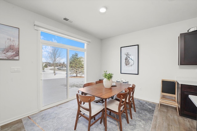 2029 Magnolia Ln, Wonder Lake, IL 60097 - dining area with light wood-style floors