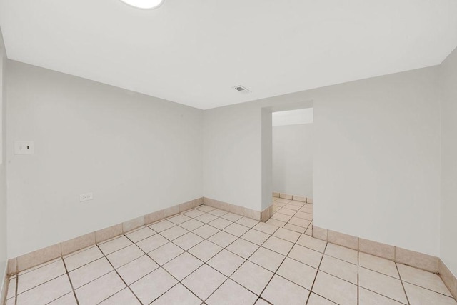 4637 S Homan Ave, Chicago, IL 60632 - empty room with light tile patterned floors and baseboards