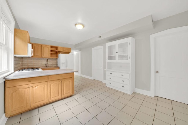 4637 S Homan Ave, Chicago, IL 60632 - kitchen with white appliances, open shelves, a peninsula, light countertops, and tasteful backsplash