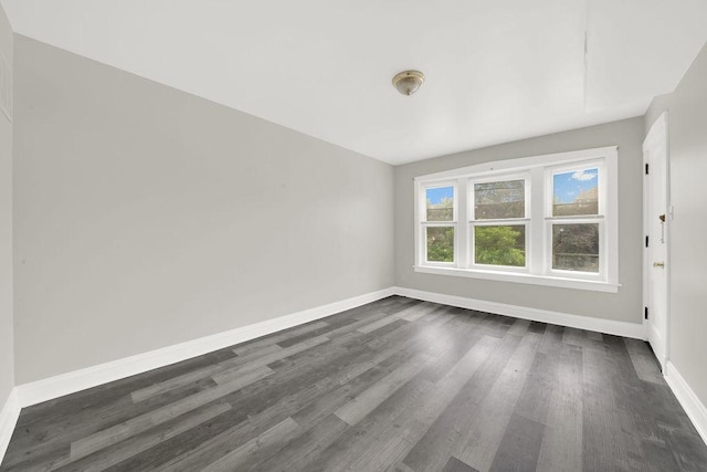 4637 S Homan Ave, Chicago, IL 60632 - empty room with baseboards and dark wood finished floors