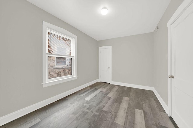 4637 S Homan Ave, Chicago, IL 60632 - unfurnished bedroom with wood finished floors and a closet
