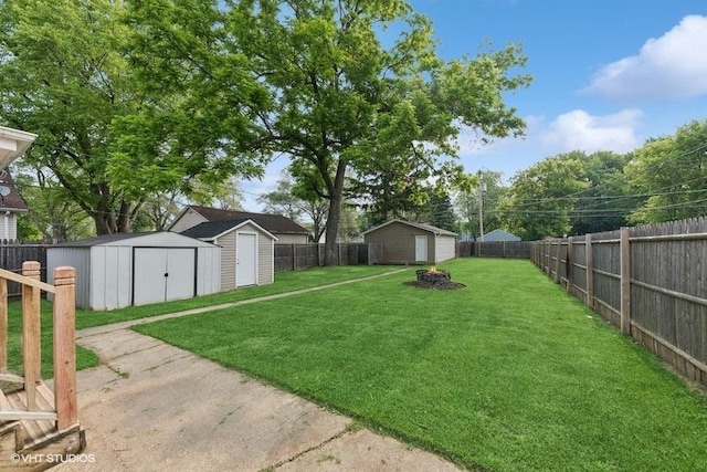 2811 Elim Ave, Zion, IL 60099 - fenced backyard with a storage shed and a garage