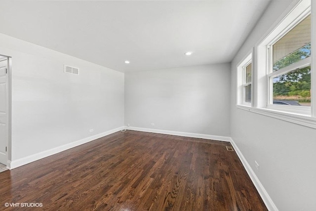 2811 Elim Ave, Zion, IL 60099 - spare room featuring dark wood-style flooring and recessed lighting