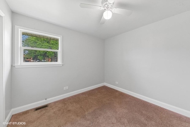 2811 Elim Ave, Zion, IL 60099 - carpeted spare room with baseboards and ceiling fan