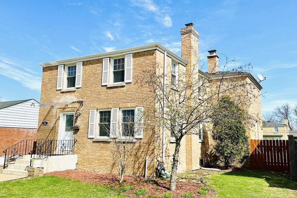 901 S Fairfield Ave, Elmhurst, IL 60126 - view of front of home featuring a chimney and brick siding