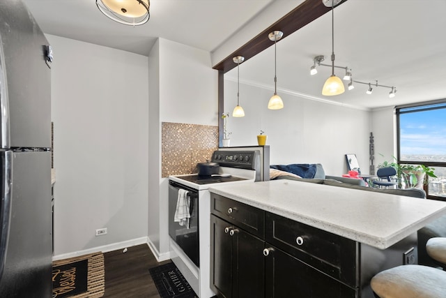 4343 N Clarendon Ave Unit 2309, Chicago, IL 60613 - kitchen with freestanding refrigerator, white electric range, dark cabinets, dark wood-style floors, and open floor plan