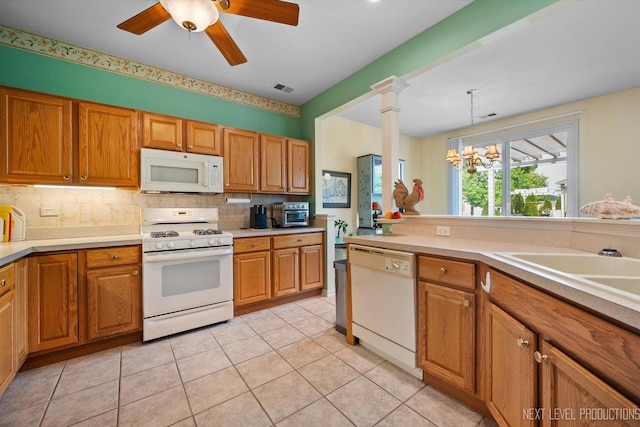 11298 Maplewood Ave, Huntley, IL 60142 - kitchen featuring white appliances, decorative backsplash, ceiling fan, and light countertops
