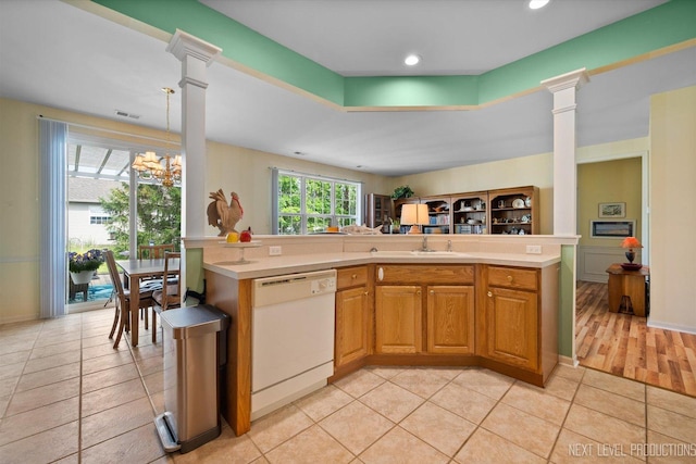 11298 Maplewood Ave, Huntley, IL 60142 - kitchen with dishwasher, ornate columns, light countertops, light tile patterned floors, and recessed lighting