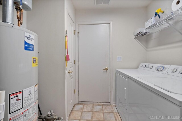 11298 Maplewood Ave, Huntley, IL 60142 - laundry room with gas water heater and independent washer and dryer