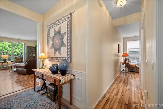 11298 Maplewood Ave, Huntley, IL 60142 - hall with wood finished floors and a wainscoted wall