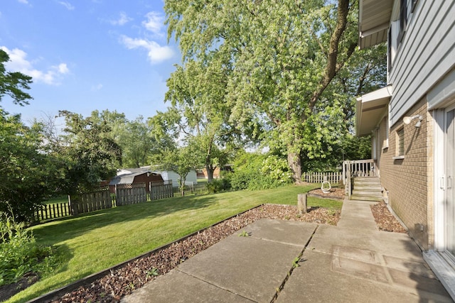 821 W Manor Ct, Glenwood, IL 60425 - view of yard featuring a patio area