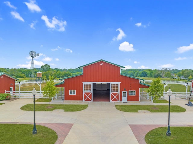12243 179th St, Mokena, IL 60448 - view of building exterior with a barn, curved driveway, and an exterior structure