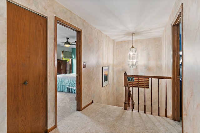 1044 Inverness Ln, Itasca, IL 60143 - hall with carpet floors, an upstairs landing, and a chandelier