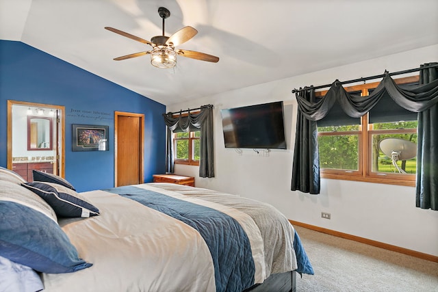 1044 Inverness Ln, Itasca, IL 60143 - carpeted bedroom with vaulted ceiling, ensuite bath, and a ceiling fan