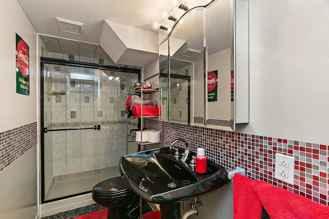 1044 Inverness Ln, Itasca, IL 60143 - bathroom featuring a stall shower, tile walls, and tasteful backsplash
