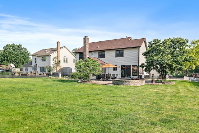 1044 Inverness Ln, Itasca, IL 60143 - rear view of property featuring a patio area and a chimney