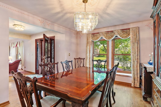 1044 Inverness Ln, Itasca, IL 60143 - dining area featuring light wood-type flooring and a chandelier