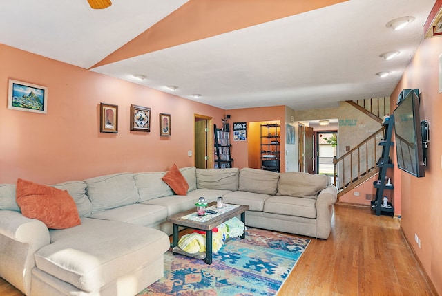 1044 Inverness Ln, Itasca, IL 60143 - living area with wood finished floors, stairway, and lofted ceiling