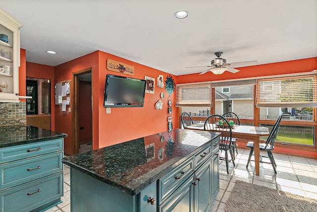 1044 Inverness Ln, Itasca, IL 60143 - kitchen featuring healthy amount of natural light, ceiling fan, tasteful backsplash, recessed lighting, and dark stone countertops