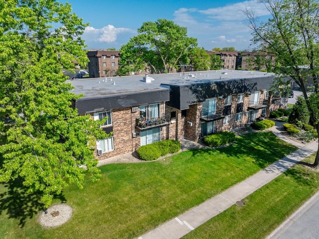 18205 Hart Dr Unit 1A, Homewood, IL 60430 - view of front of property featuring a front lawn and stone siding