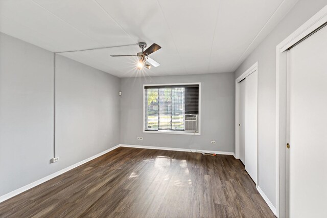 18205 Hart Dr Unit 1A, Homewood, IL 60430 - unfurnished bedroom featuring dark wood-style flooring and ceiling fan
