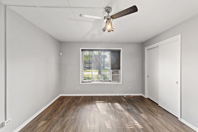18205 Hart Dr Unit 1A, Homewood, IL 60430 - unfurnished bedroom with wood finished floors, ceiling fan, and a closet